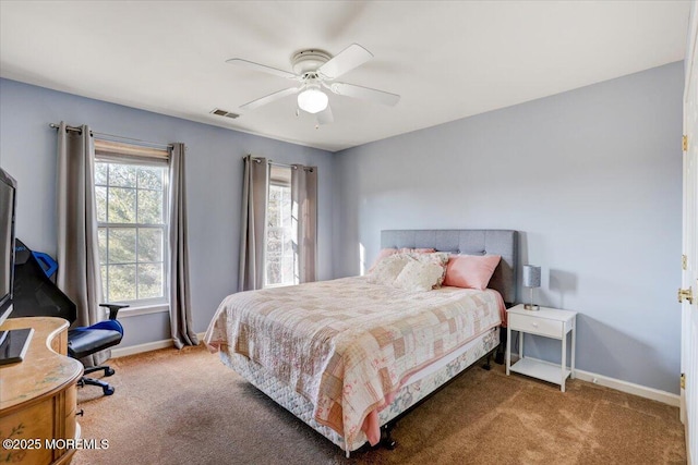 carpeted bedroom featuring ceiling fan