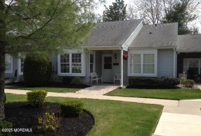 ranch-style house with a front yard