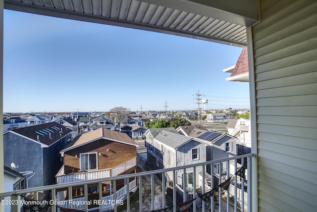 balcony featuring a residential view