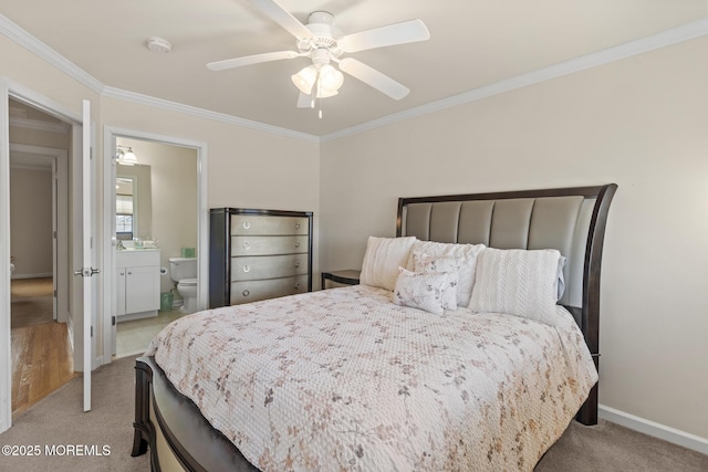 bedroom featuring ornamental molding, light colored carpet, baseboards, and a ceiling fan