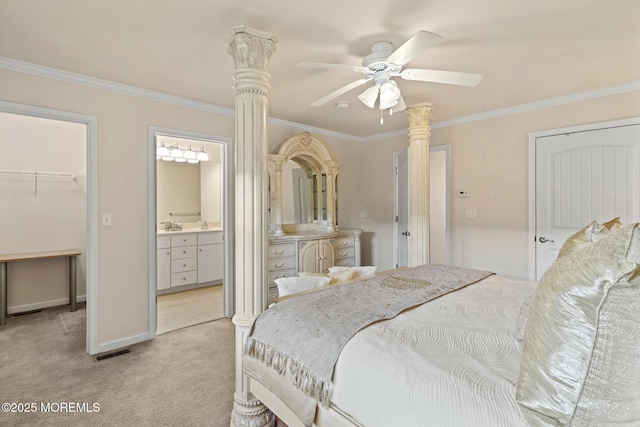 bedroom featuring visible vents, light colored carpet, ornamental molding, a spacious closet, and a closet