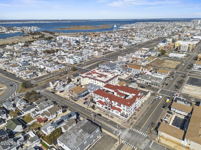 bird's eye view featuring a water view and a view of city