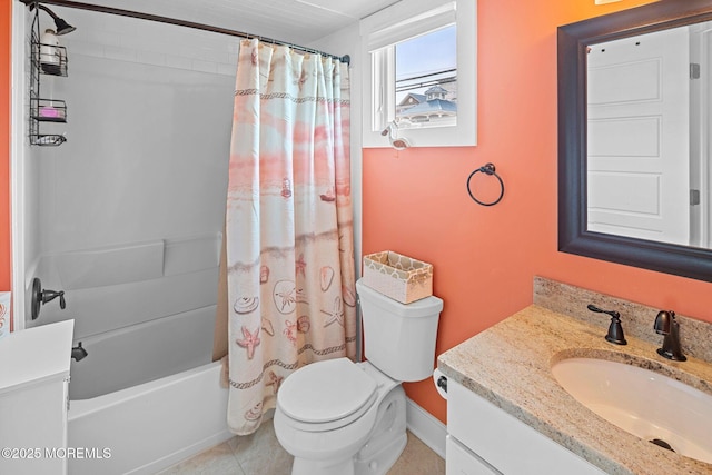 full bathroom featuring vanity, tile patterned floors, toilet, and shower / bath combo