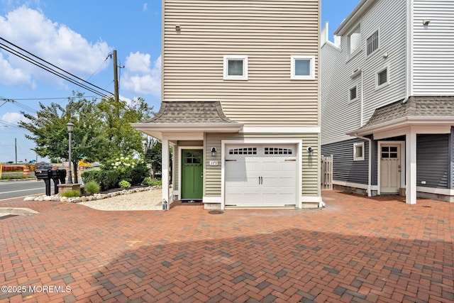 view of front of property featuring a garage