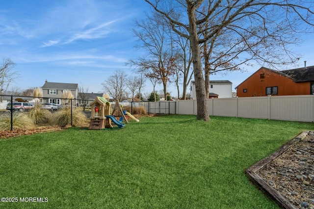 view of yard with a playground