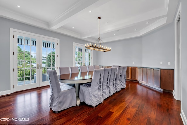 dining space with beam ceiling, dark hardwood / wood-style floors, ornamental molding, french doors, and a chandelier