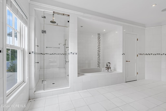 bathroom with separate shower and tub