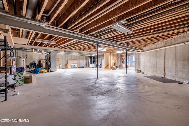 basement featuring water heater