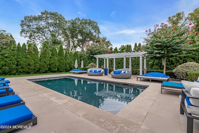 view of pool featuring an outdoor living space, a pergola, and a patio