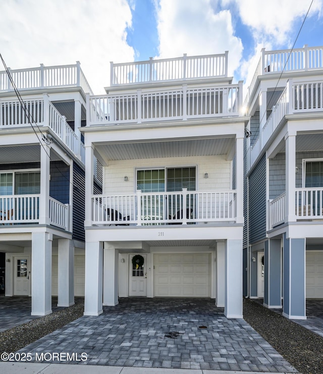 view of front of property with a garage