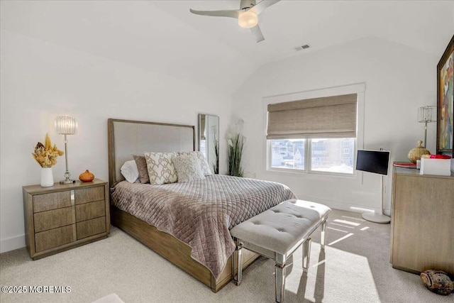 carpeted bedroom with ceiling fan and lofted ceiling