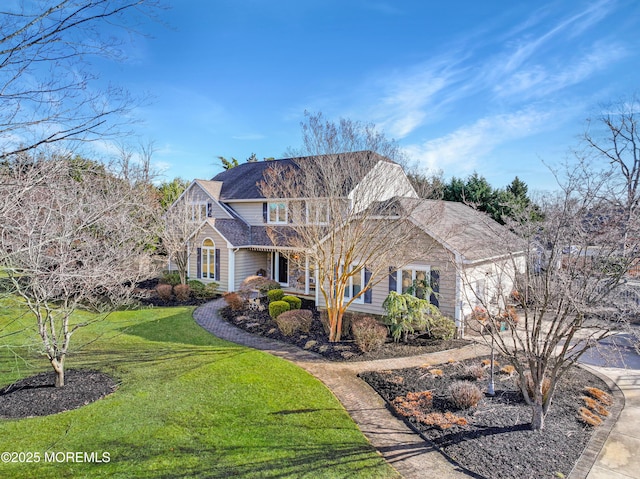 view of property with a front lawn