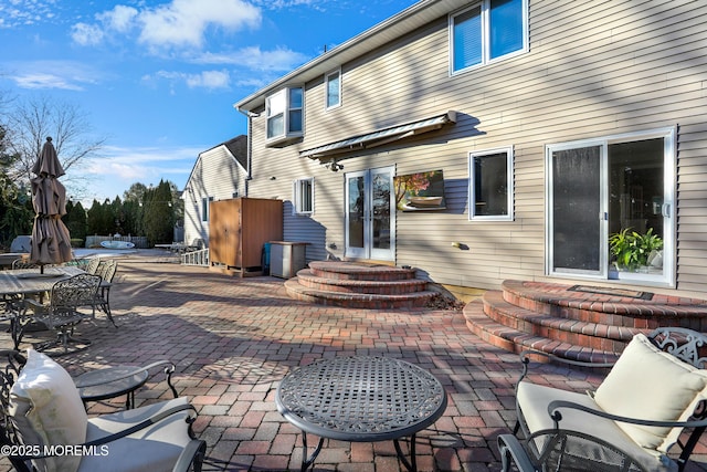 back of property with a patio area