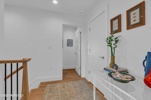 corridor featuring light hardwood / wood-style floors