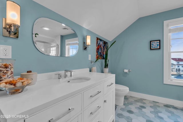 bathroom with vanity, an enclosed shower, vaulted ceiling, and toilet