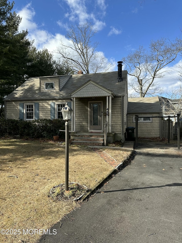 view of front of house featuring a carport