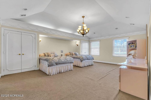 carpeted bedroom with a chandelier, ornamental molding, a raised ceiling, and vaulted ceiling