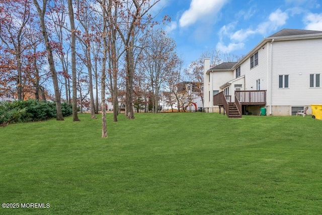 view of yard with a deck