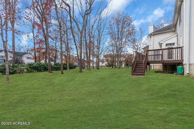 view of yard featuring a deck