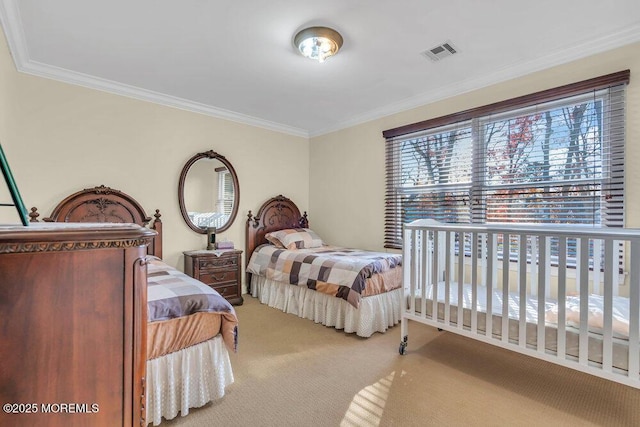 carpeted bedroom with crown molding