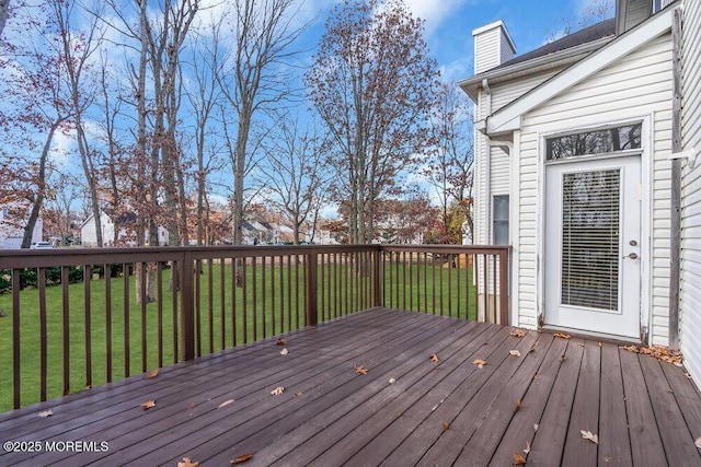 wooden deck with a yard