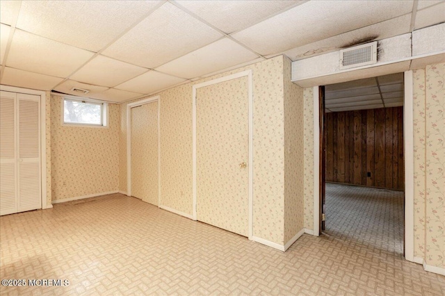 basement with a drop ceiling