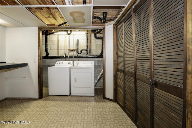 laundry area with washer and clothes dryer