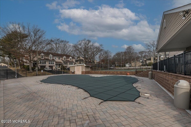 view of pool featuring a patio area