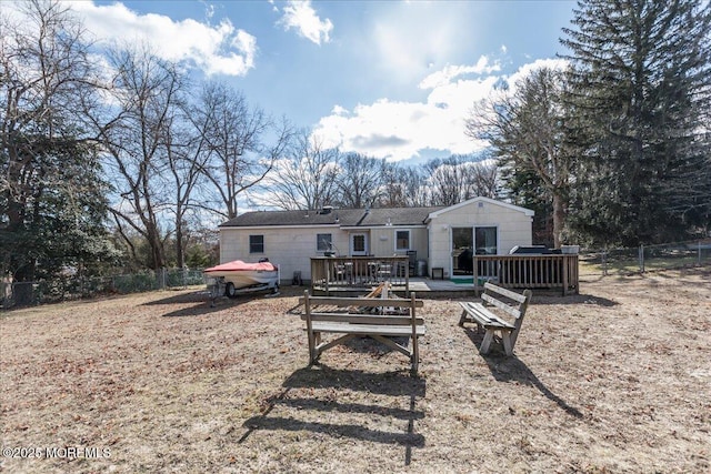 rear view of house with a deck