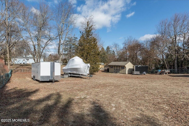 view of yard with a shed