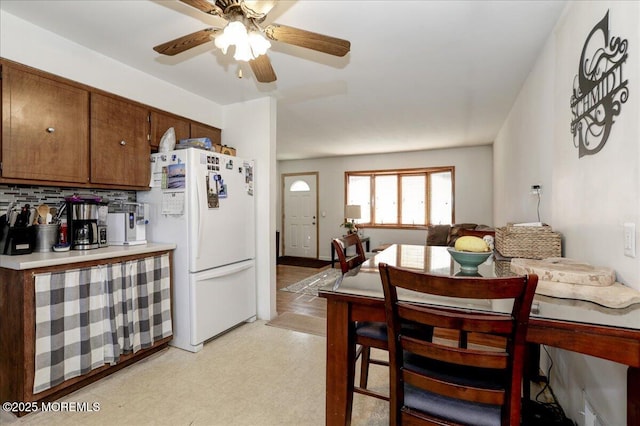 dining space with ceiling fan