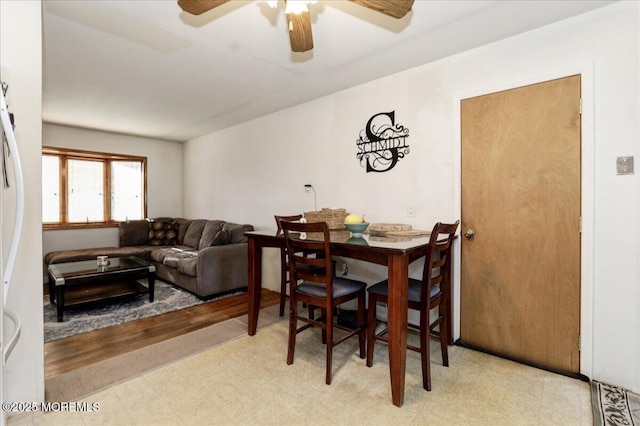 dining room featuring ceiling fan