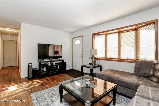 living room featuring dark hardwood / wood-style floors