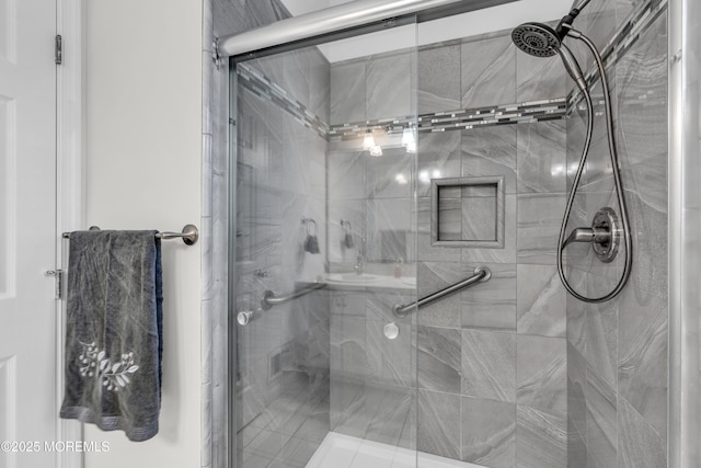 bathroom featuring a shower stall