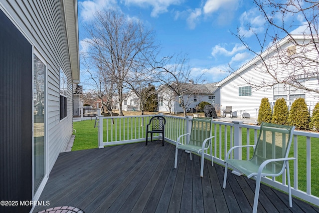 deck featuring a yard