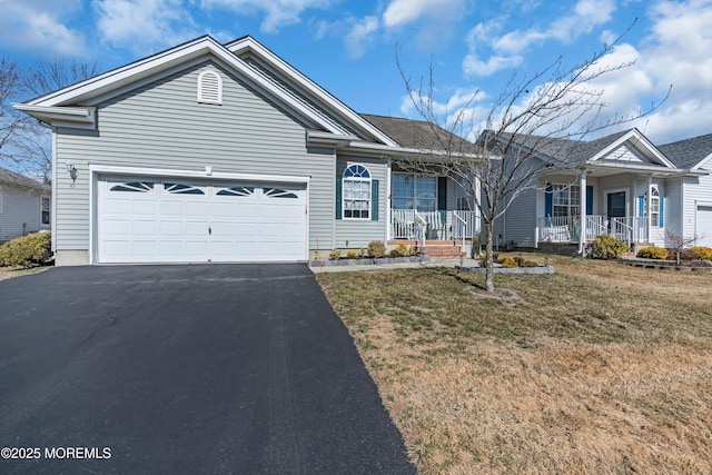 ranch-style house with a garage, a porch, a front yard, and aphalt driveway