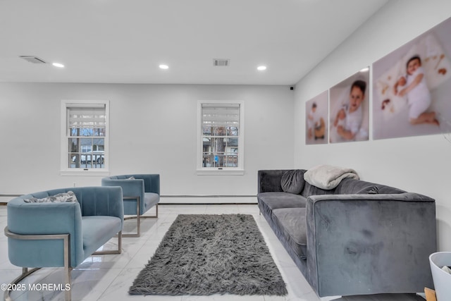 living room featuring a baseboard radiator