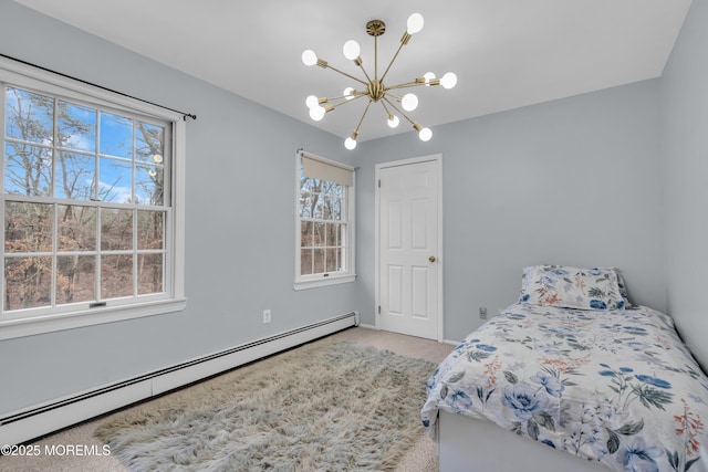 bedroom featuring a baseboard radiator, a chandelier, and carpet