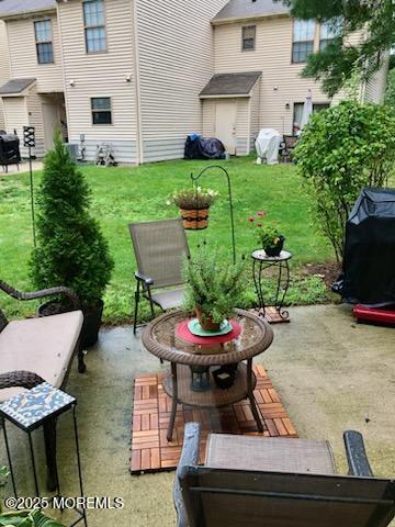 view of patio with a grill