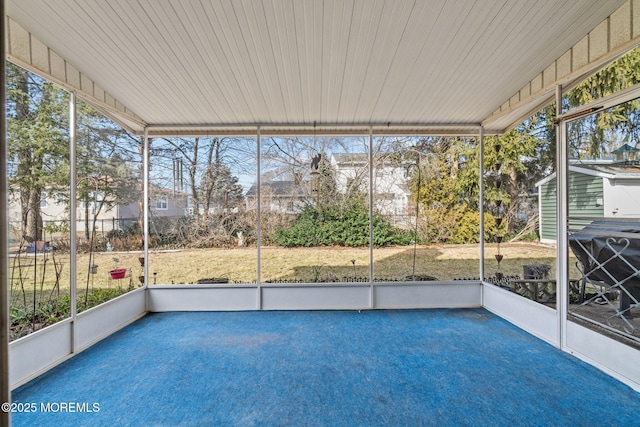 unfurnished sunroom featuring plenty of natural light