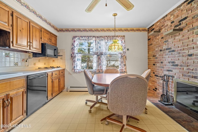 kitchen with a baseboard heating unit, a fireplace, black appliances, decorative backsplash, and decorative light fixtures