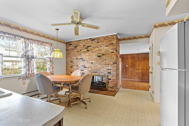 dining room featuring ceiling fan