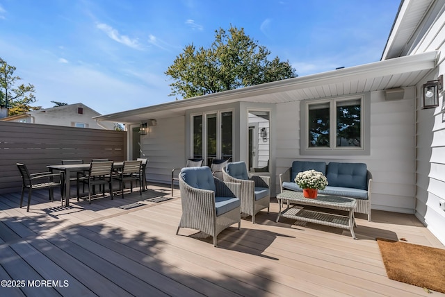 deck featuring an outdoor living space