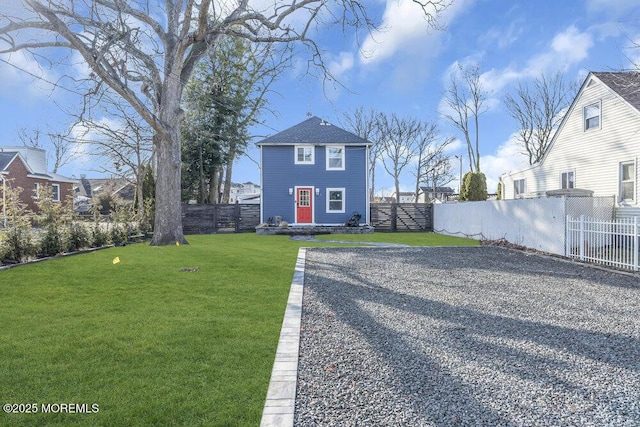 exterior space with a front yard