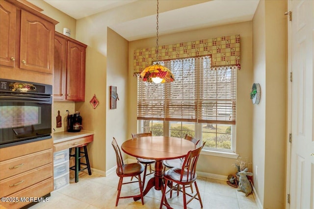 dining room featuring light tile patterned flooring