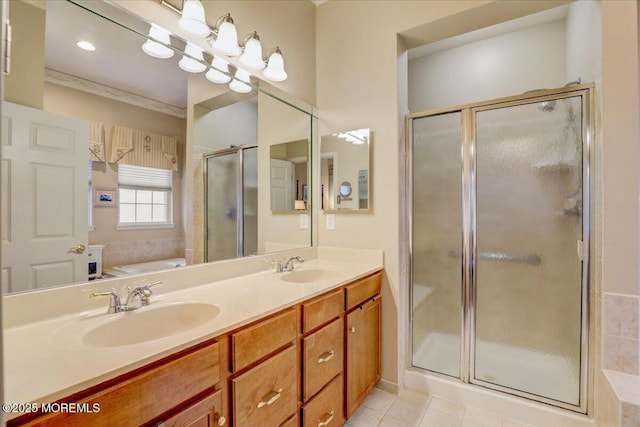 bathroom featuring vanity, separate shower and tub, tile patterned floors, and crown molding