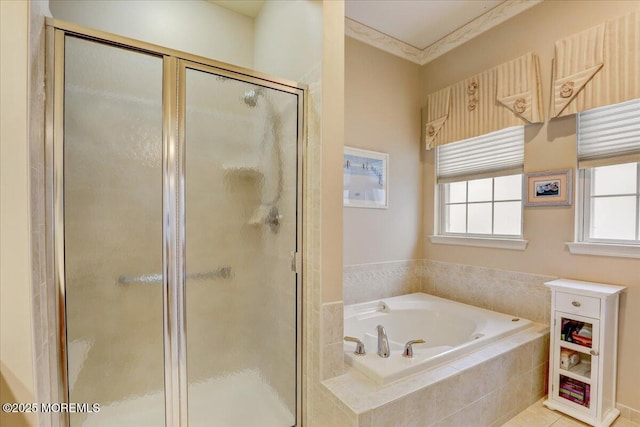 bathroom with shower with separate bathtub