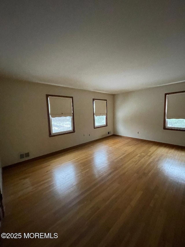 empty room featuring light hardwood / wood-style floors