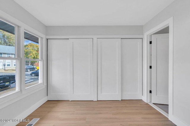 100 Governors Rd Unit 1000, Lakewood, NJ 08701 - interior space featuring two closets and light wood-type flooring
