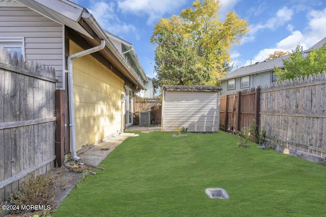 100 Governors Rd Unit 1000, Lakewood, NJ 08701 - view of yard featuring central AC and a shed